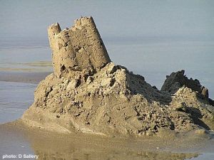 Would that our prison industrial complex could disappear like this sand castle